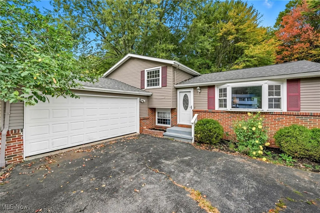 2 car attached garage, blacktop driveway