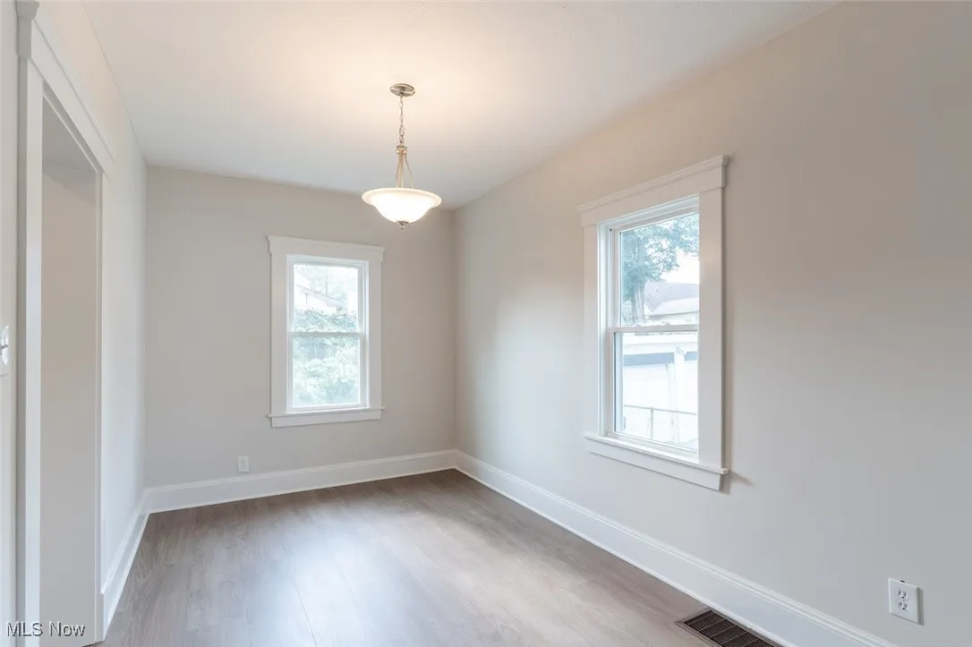 Unfurnished dining area featuring light wood-style floors