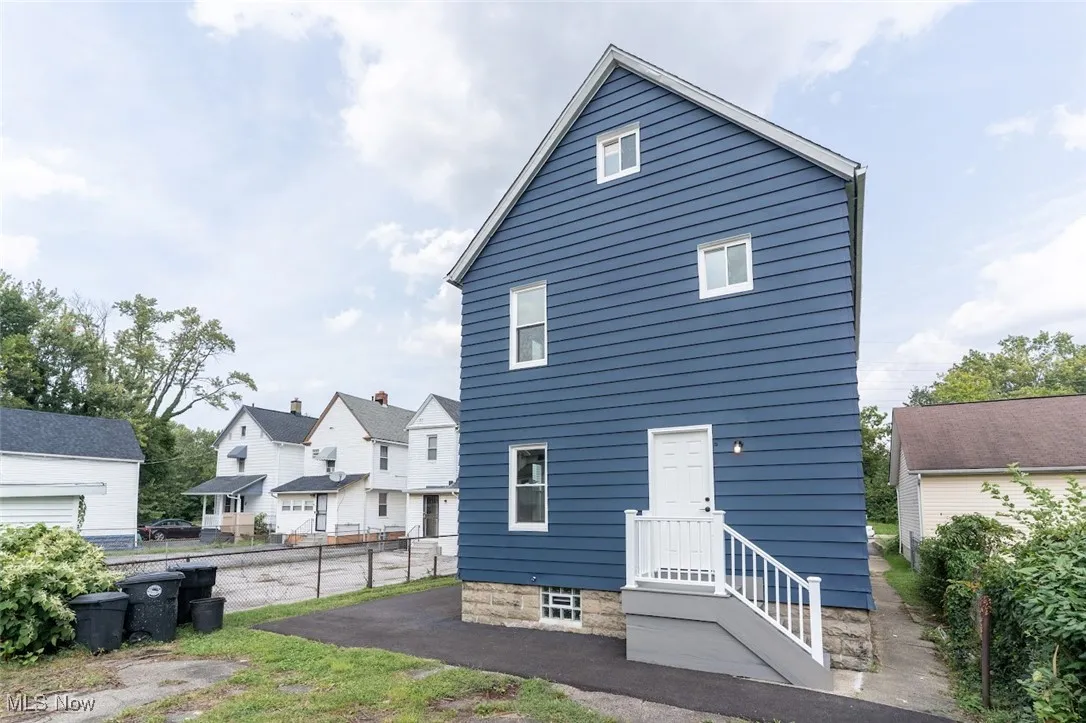 Rear view of property with a patio
