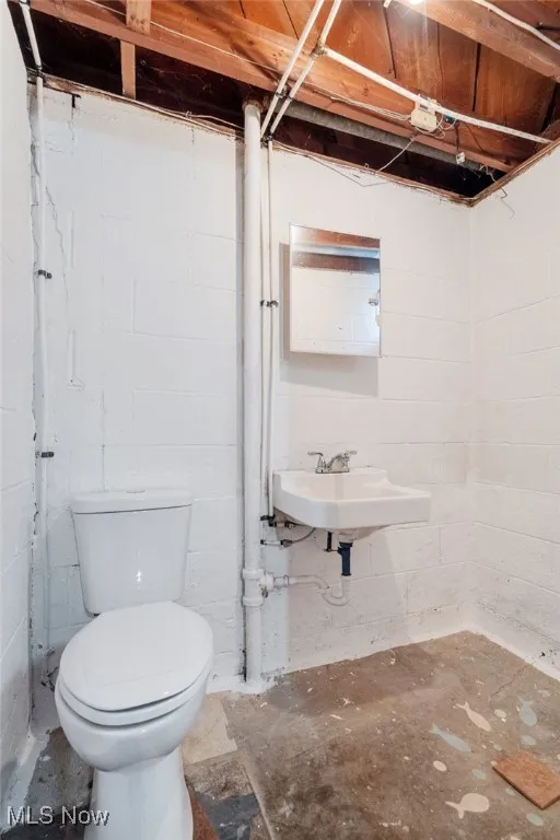 Basement Bathroom with Toilet and Sink