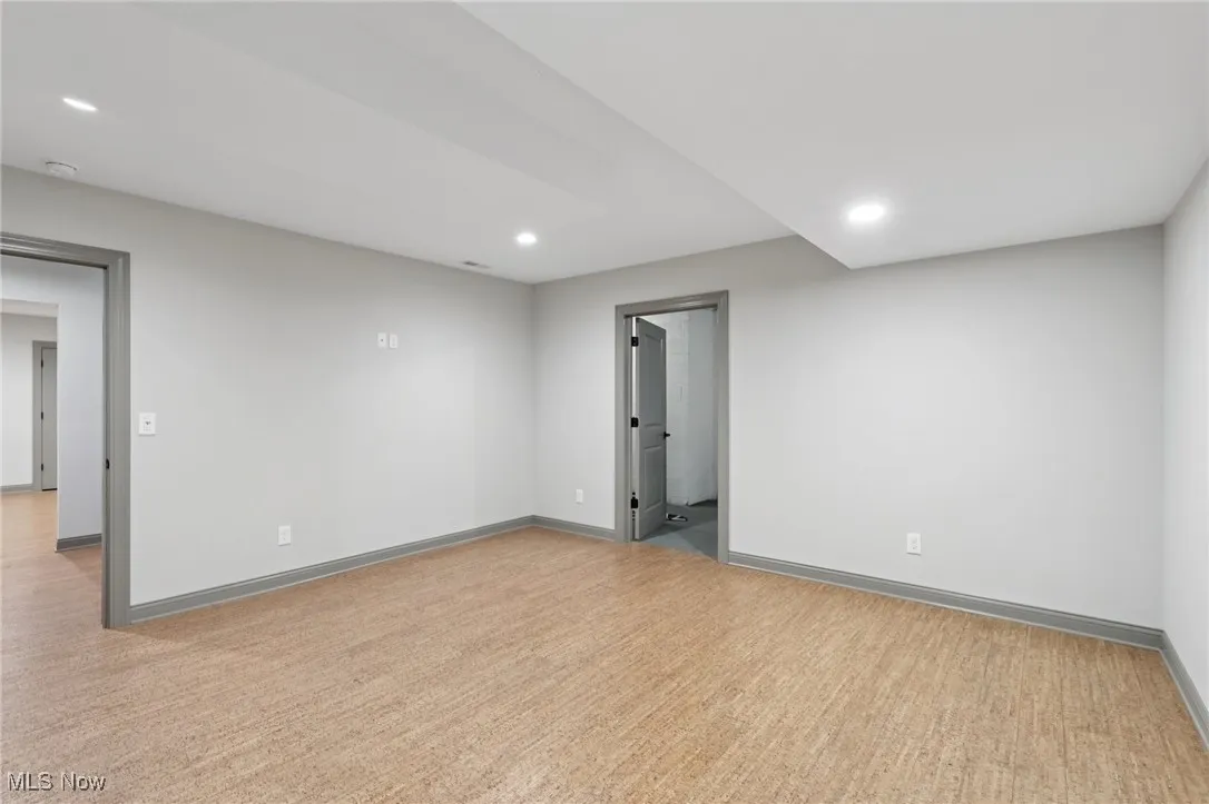 Spare room featuring recessed lighting and light wood finished floors