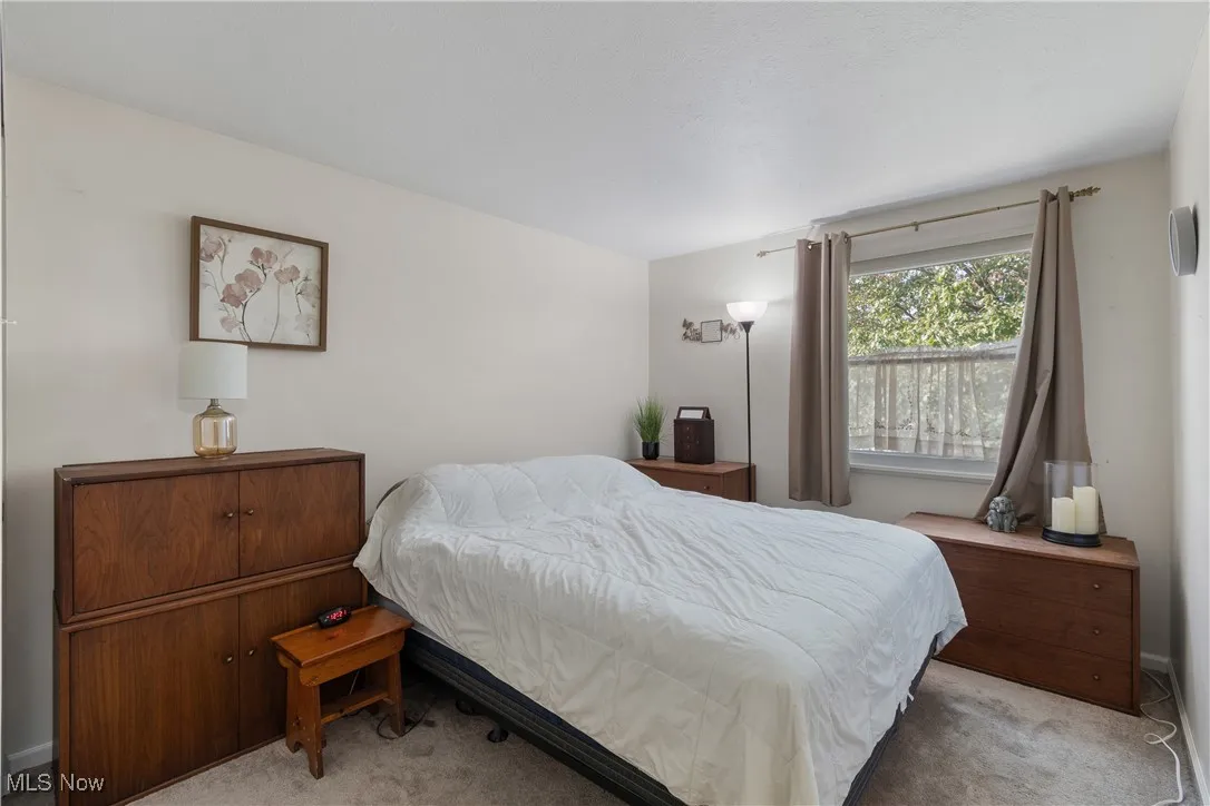 Bedroom with carpet flooring