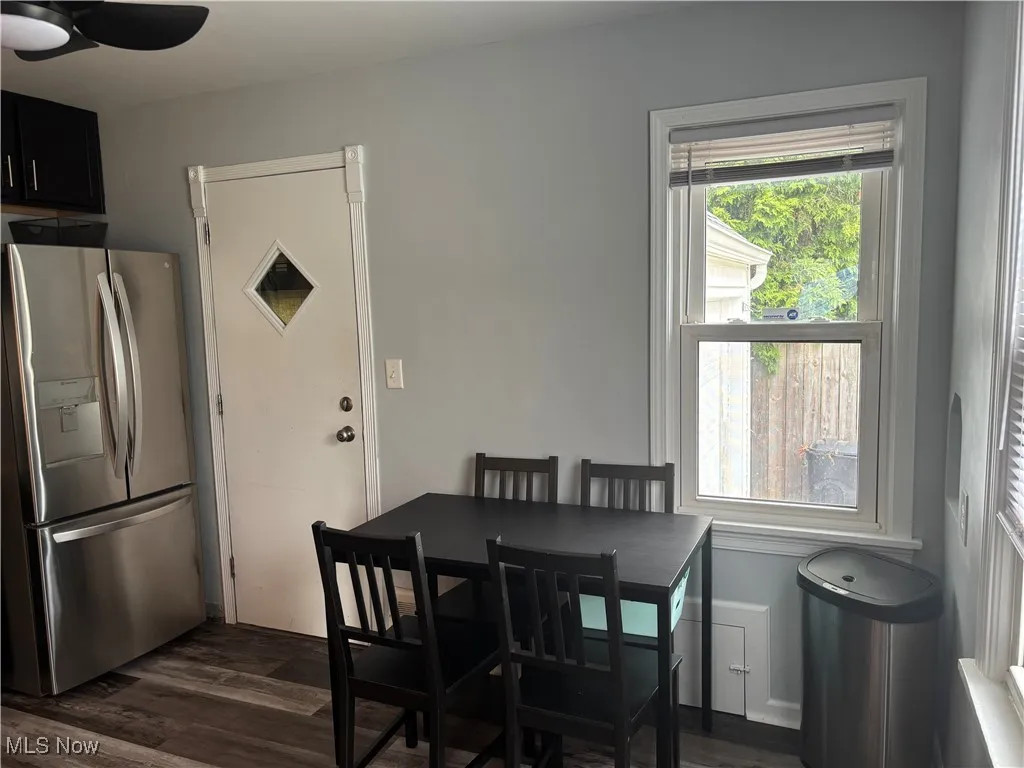 Dining area featuring dark wood finished floors