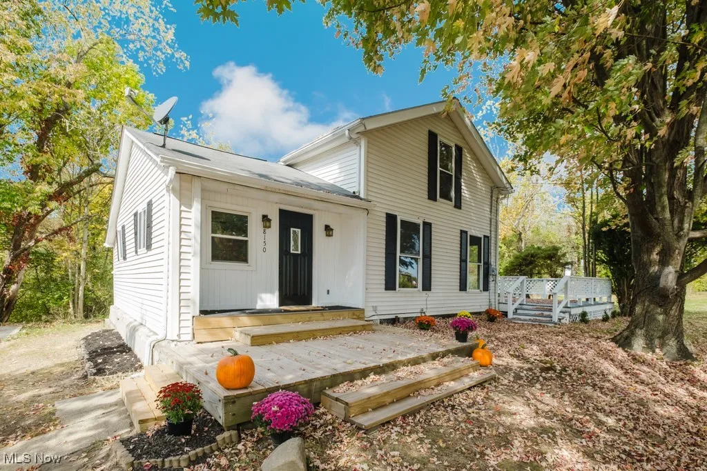 View of front of property featuring a deck