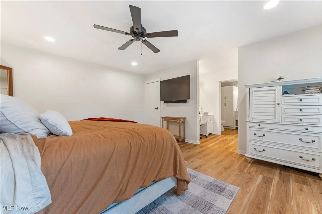 Bedroom featuring light wood-style floors, recessed lighting, and ceiling fan