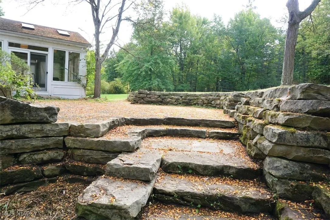 View of patio adjacent to the sunroom