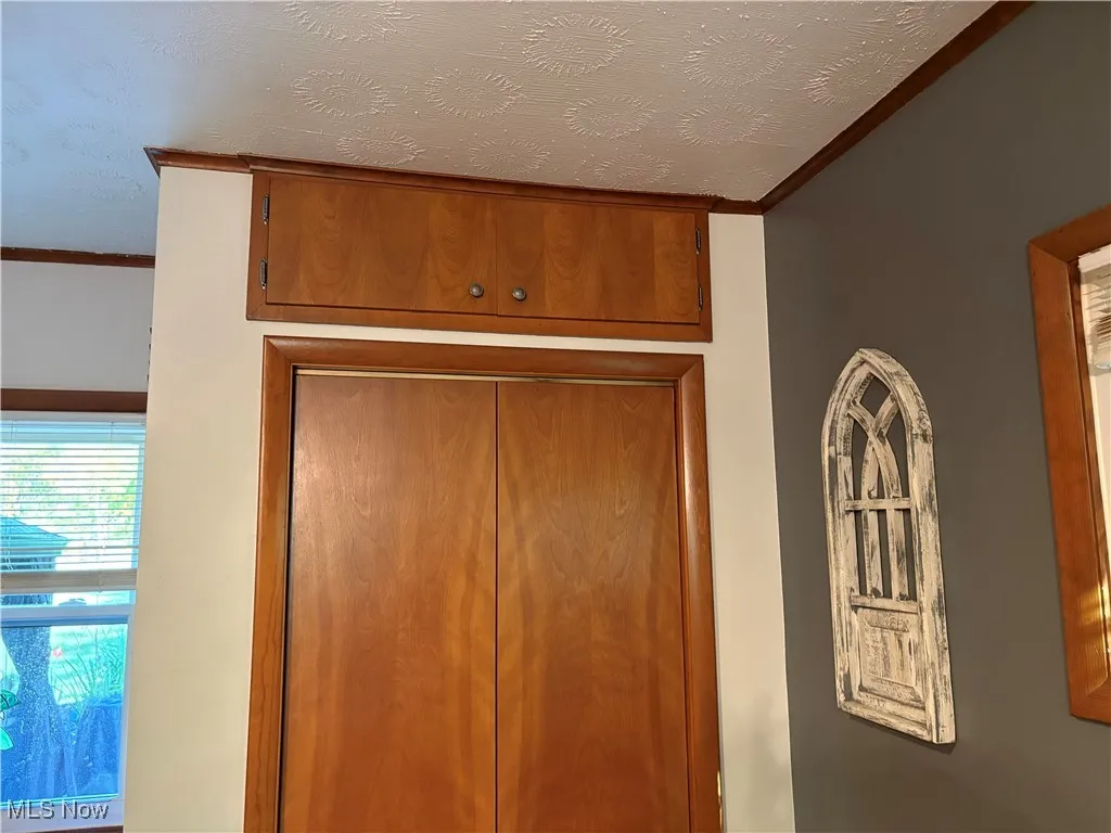 More storage area above closet in Master Bedroom