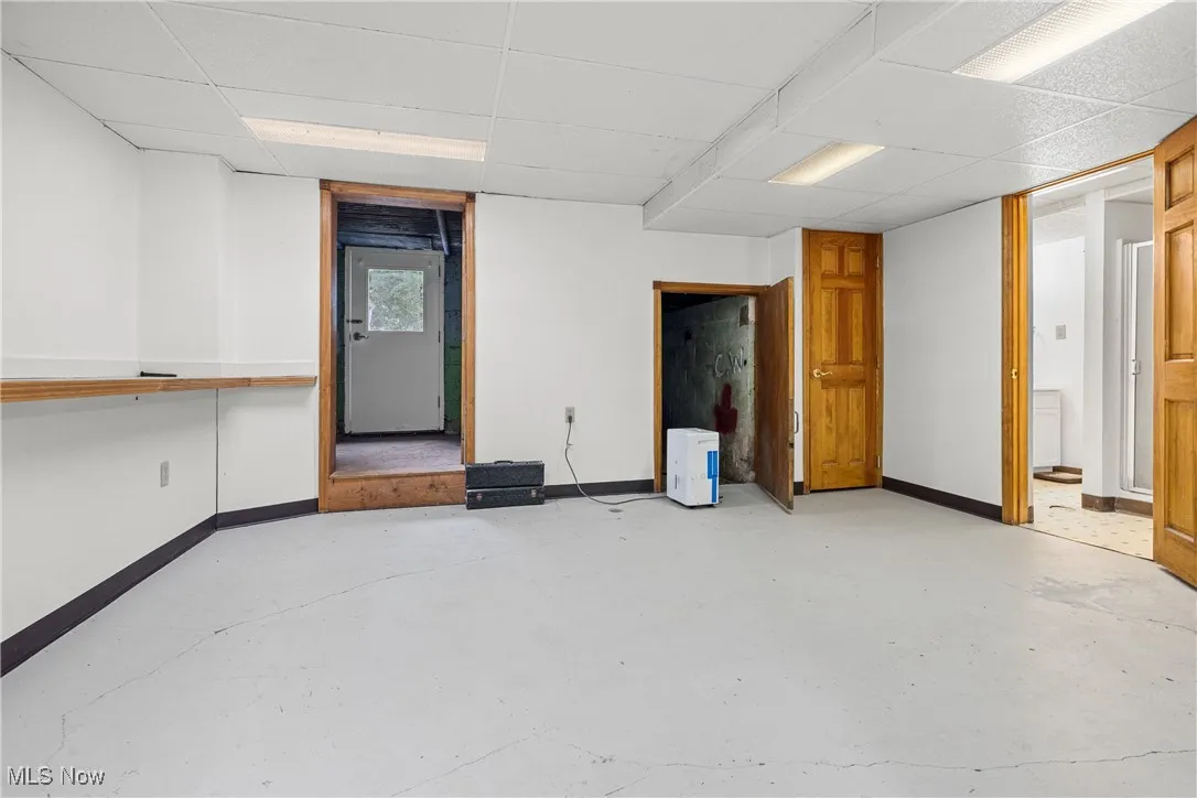 Below grade area with a drop ceiling