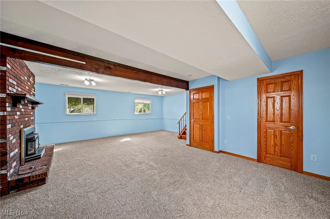 New carpet installed 9/23/25 great size room perfect for parties or family time.   Access to full bath and lower level.