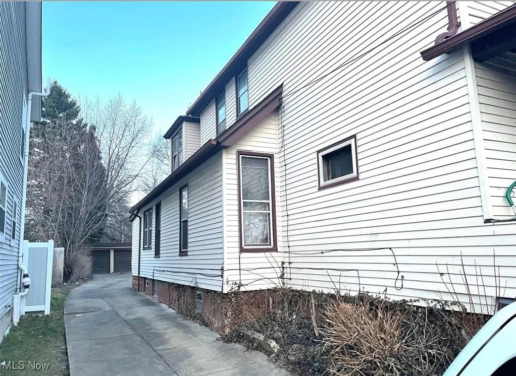 View of side of property (driveway side)