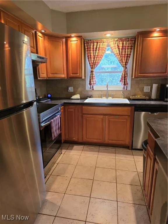 View of kitchen area with appliances