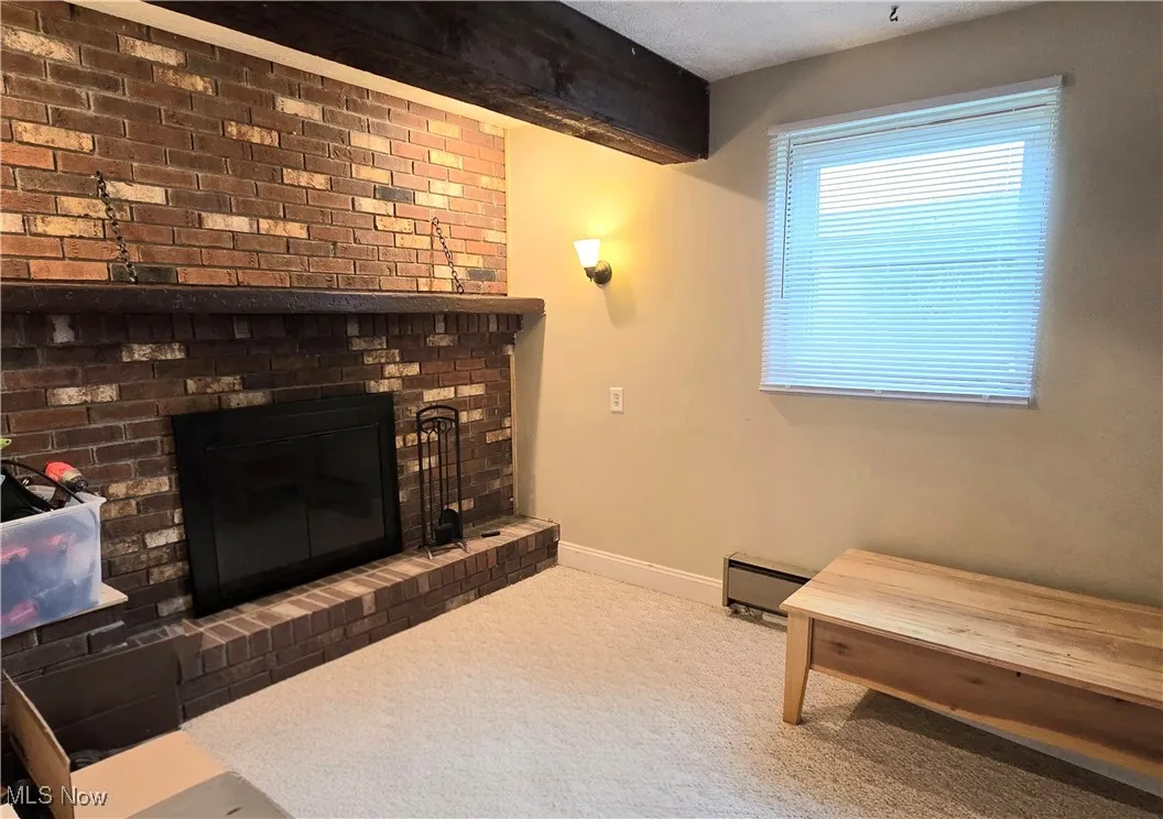 View of fireplace area in lower level