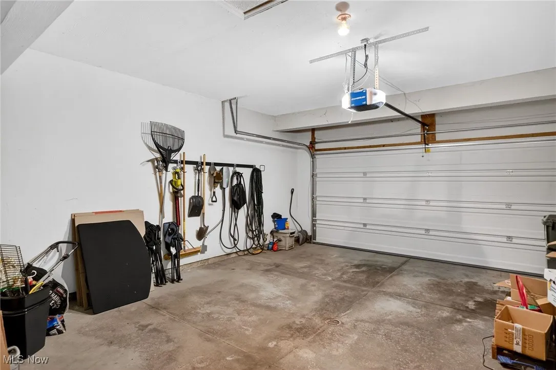 Garage featuring a garage door opener