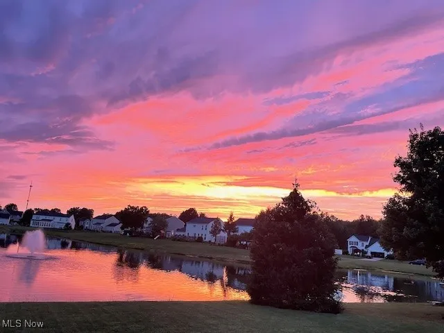 Water view featuring nearby suburban area