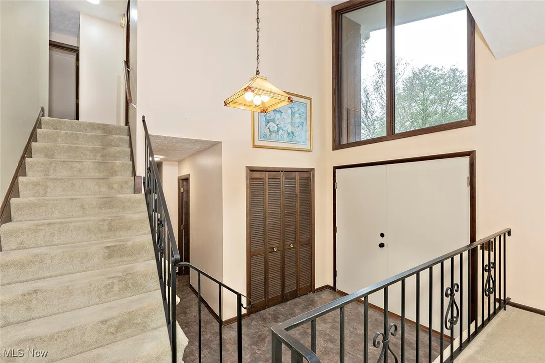 Expansive view of Foyer and staircase to Second Floor