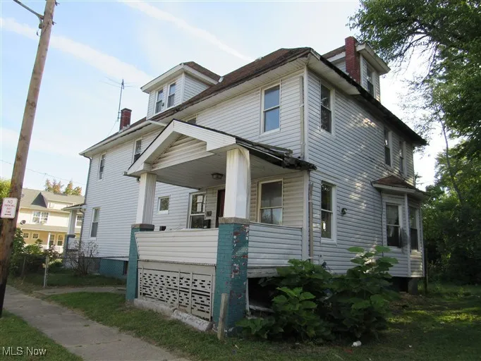 View of front of house with covered porch