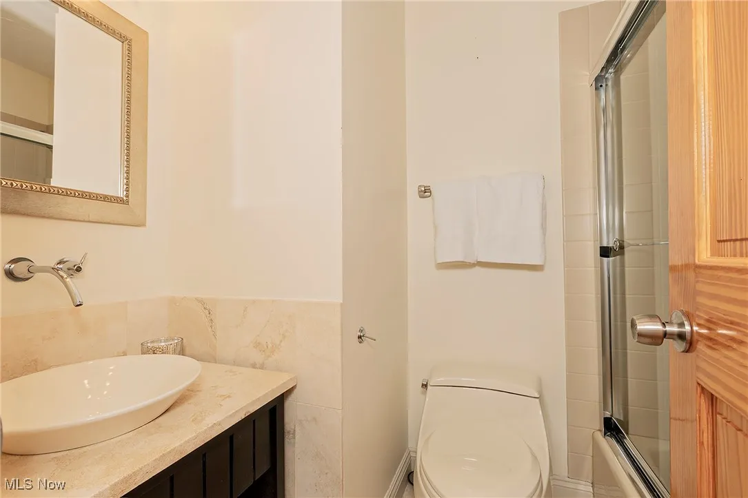 The 2nd bathroom on the main level with tub/shower combination