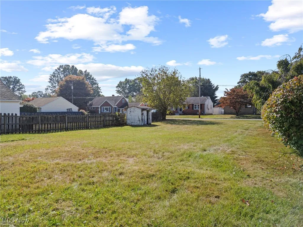 View of yard with a shed