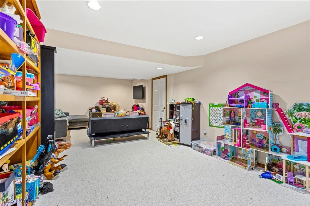 Game room featuring carpet and recessed lighting