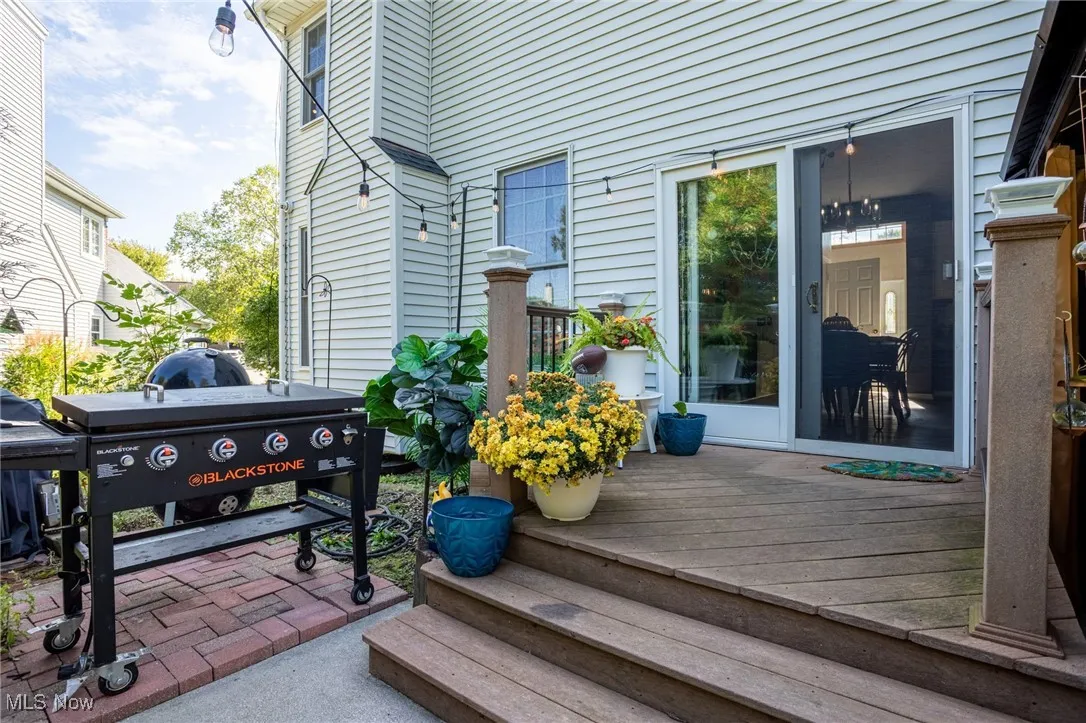 Deck featuring a patio and a grill