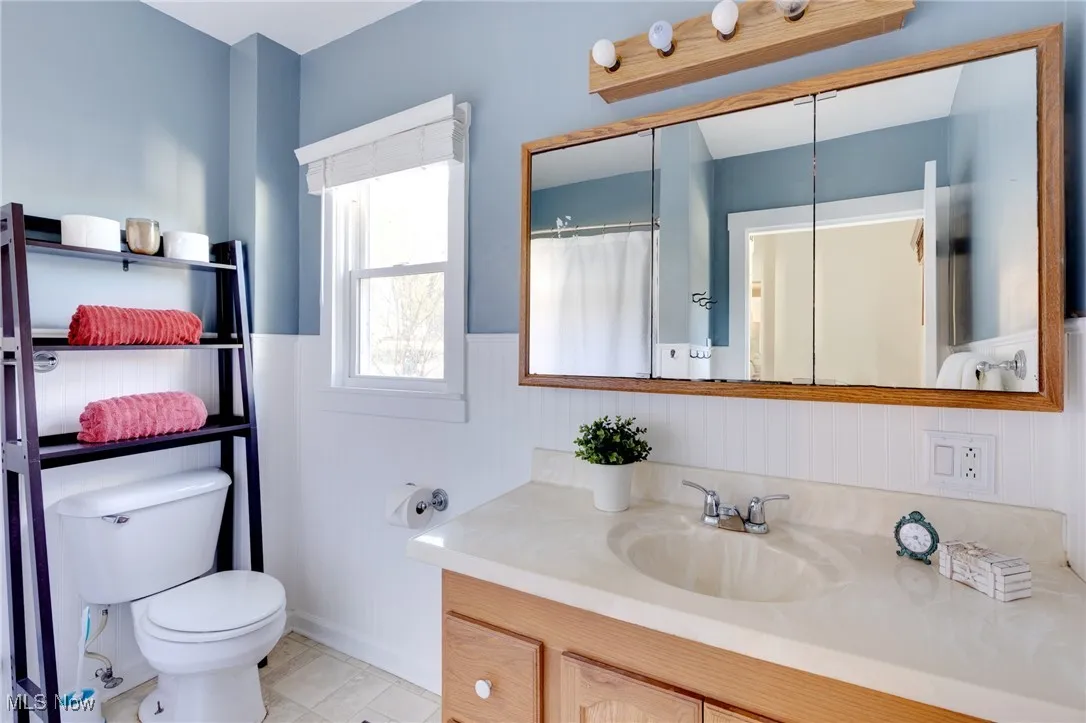 This is the main bath on the first floor which has a shower/tub combo and updated vanity/lights.
