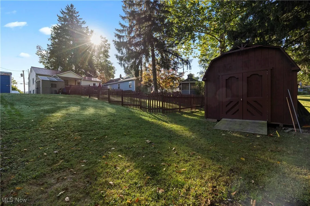 View of yard featuring a storage shed