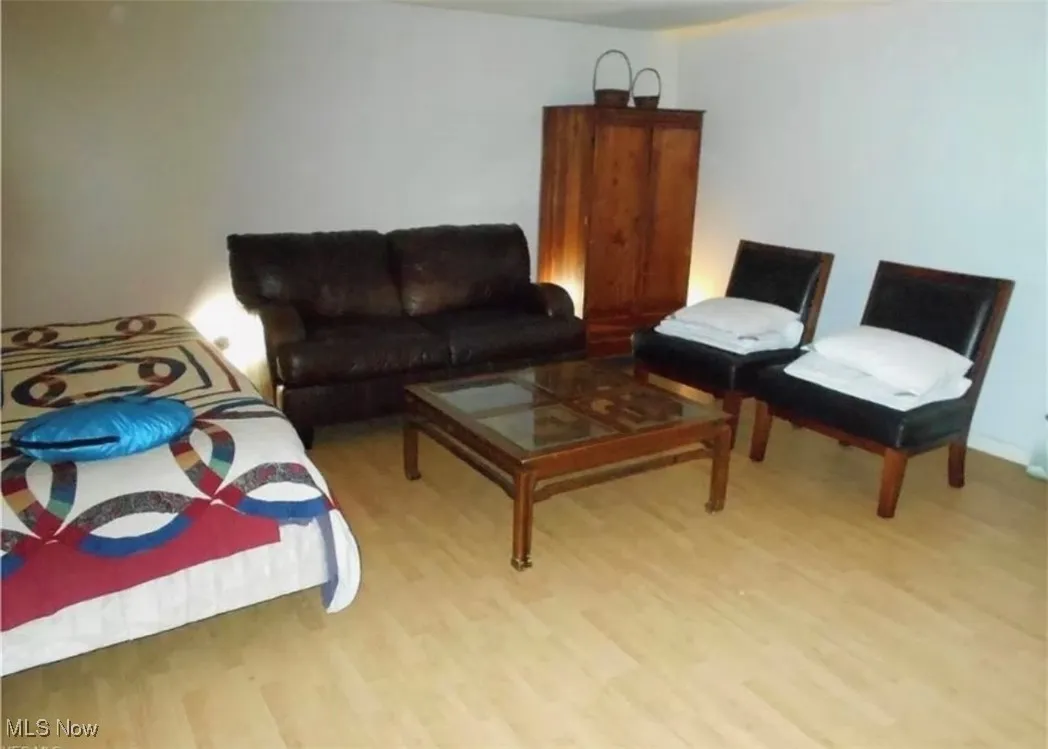 Living area featuring light wood-type flooring