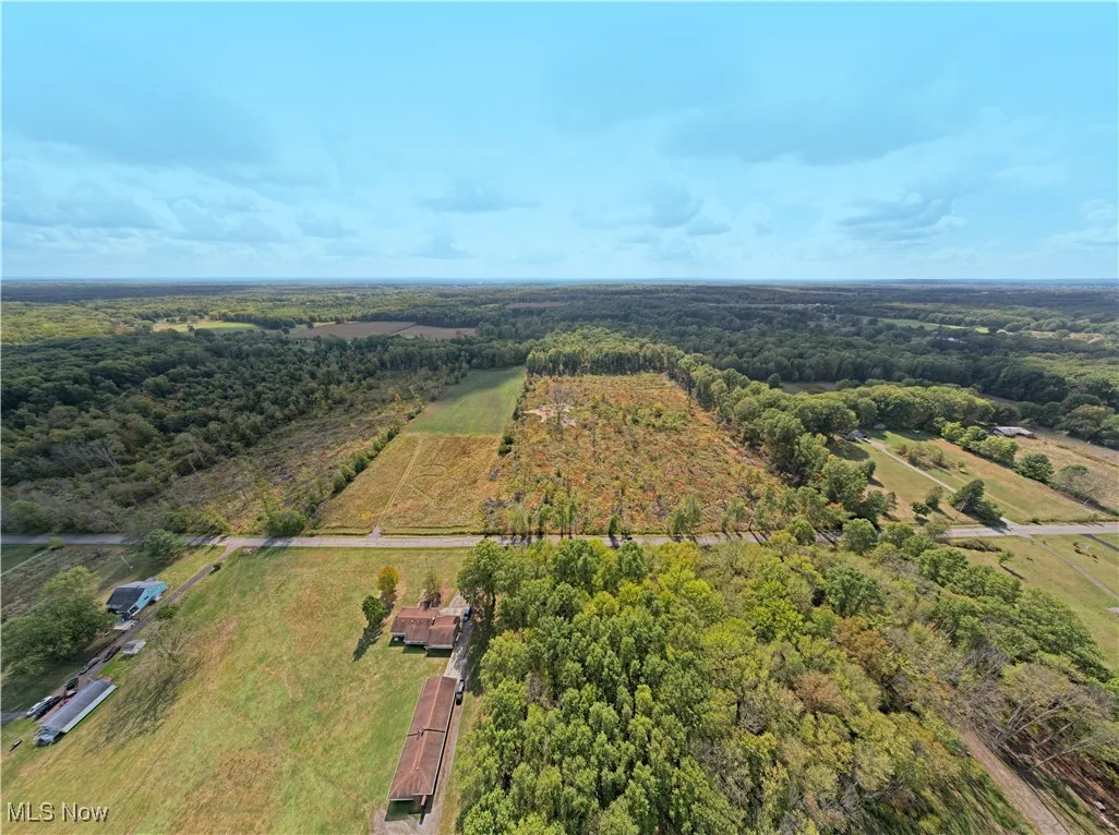 Aerial view of property and surrounding area.