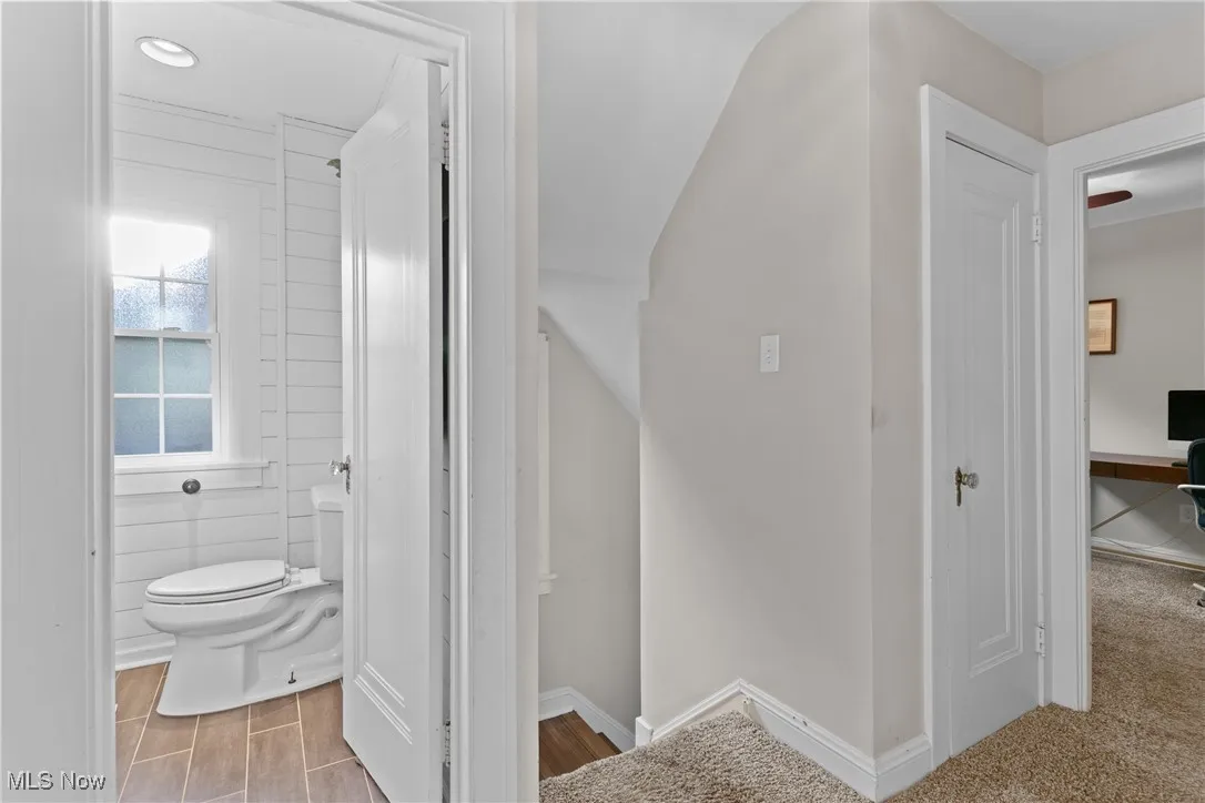 Stairs featuring baseboards