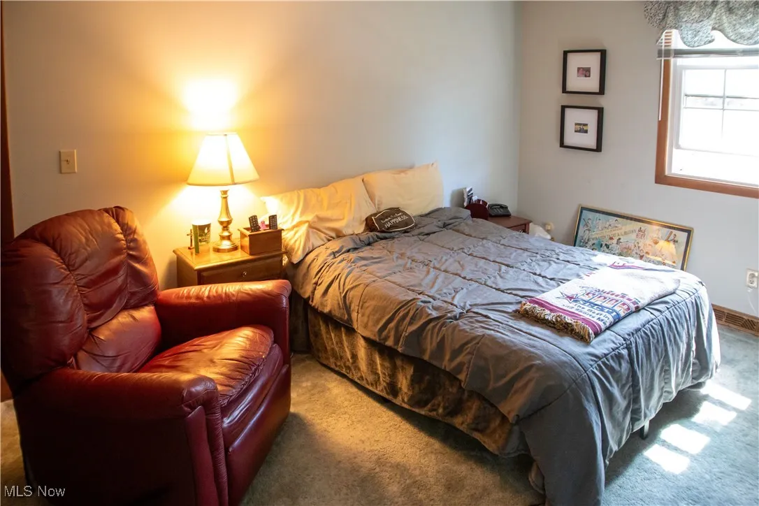 Bedroom featuring carpet floors