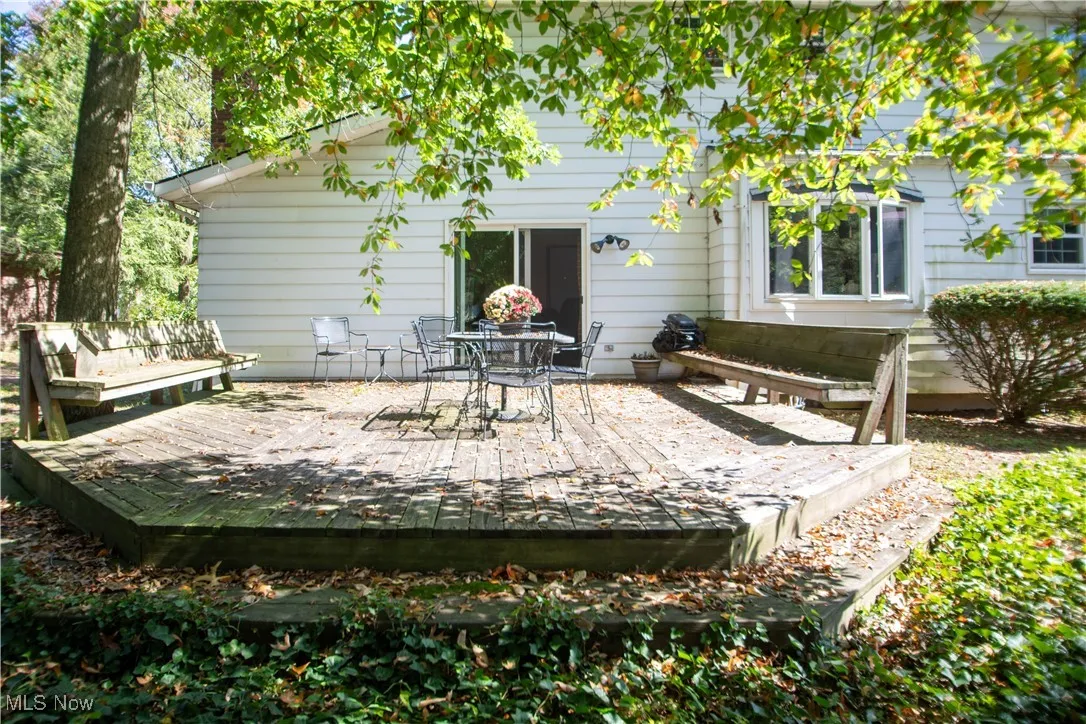 Rear view of house with a deck