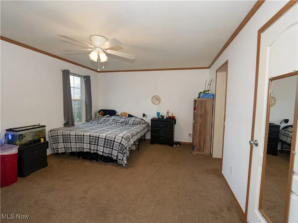 Master bedroom with walk in closet and en-suite bathroom.