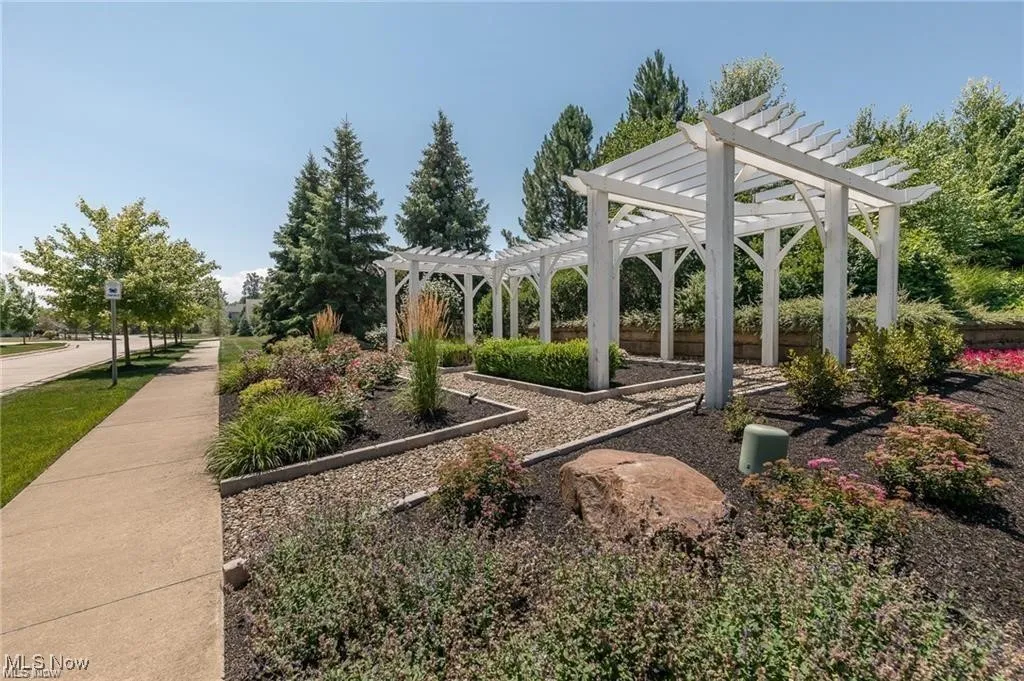 View of home's community featuring a pergola