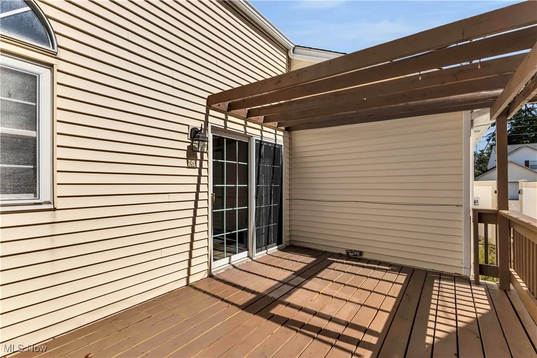 View of wooden deck with new deck boards.