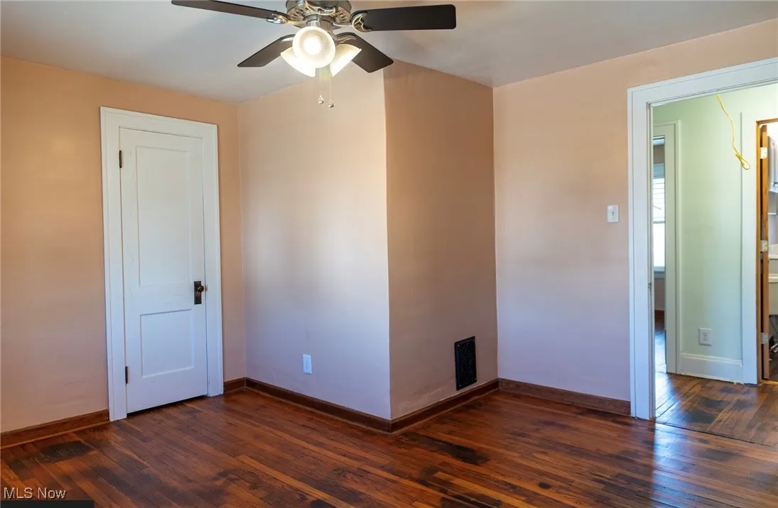Bedroom  featuring hardwood-style flooring and ceiling fan