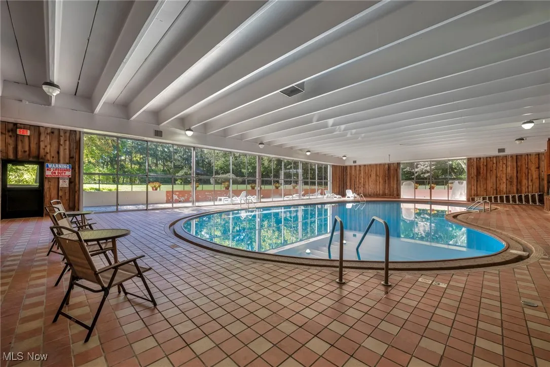 Indoor pool with a patio