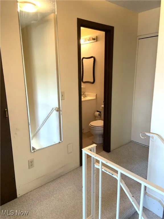 Hallway upstairs, three bedrooms, two full bathrooms, linen closet and furnace closet
