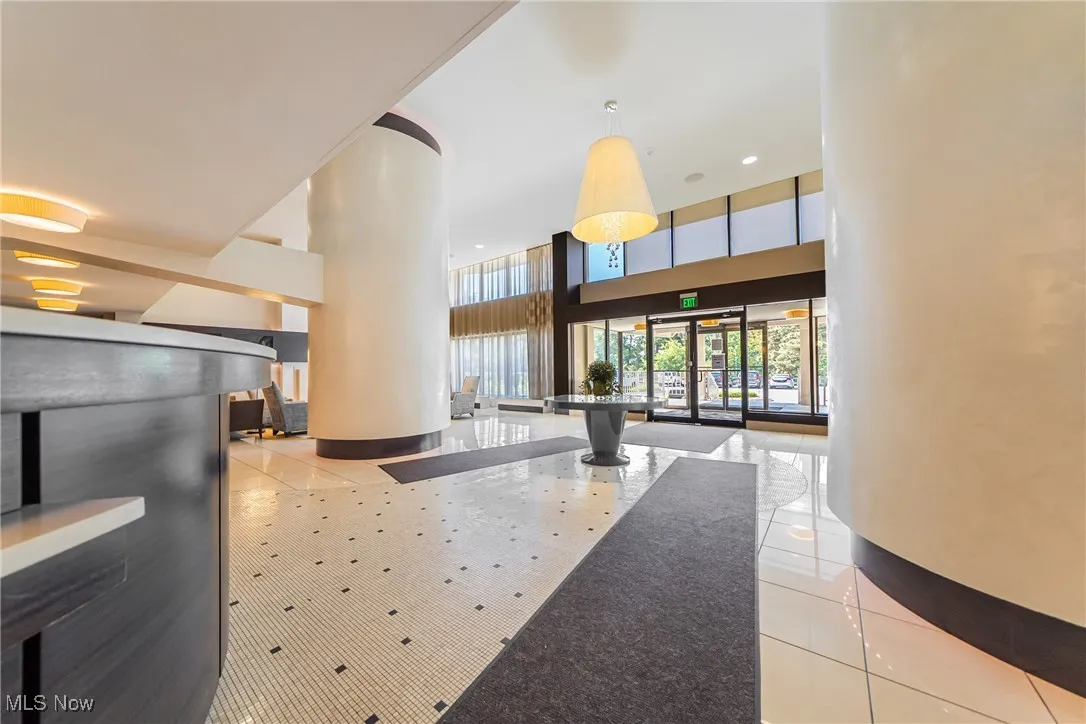 Building lobby with a high ceiling and recessed lighting