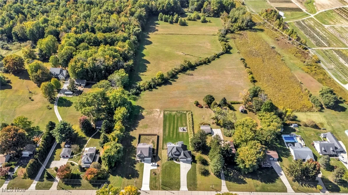 Aerial view of sparsely populated area with agricultural land
