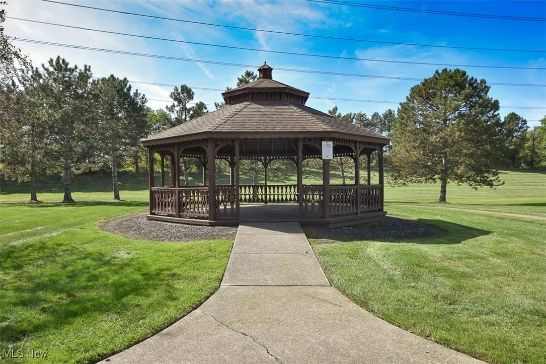 View of community with a gazebo and a lawn