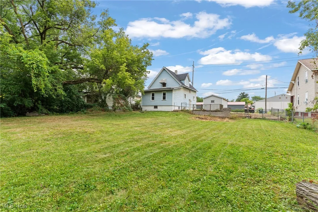 View of yard with a deck