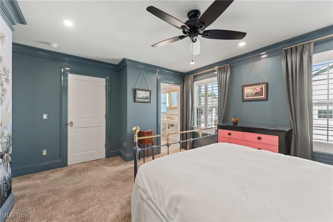 Bedroom featuring crown molding, light colored carpet, ceiling fan, and recessed lighting