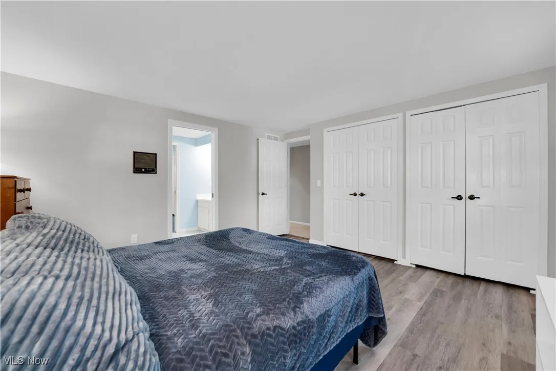 Fresh white closets with organizers and freshly painted in neutral colors