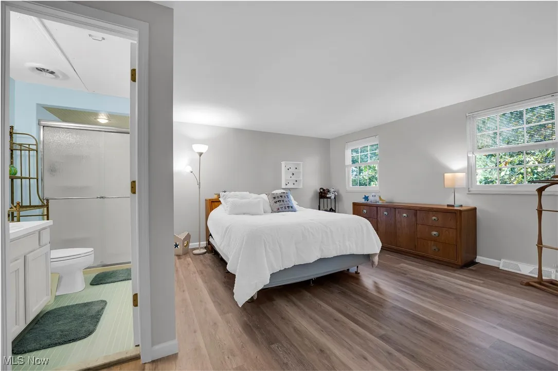 This bedroom has its own private bathroom - also has double closets and new Luxury vinyl flooring