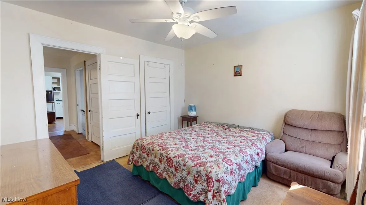 Bedroom featuring a closet and a ceiling fan