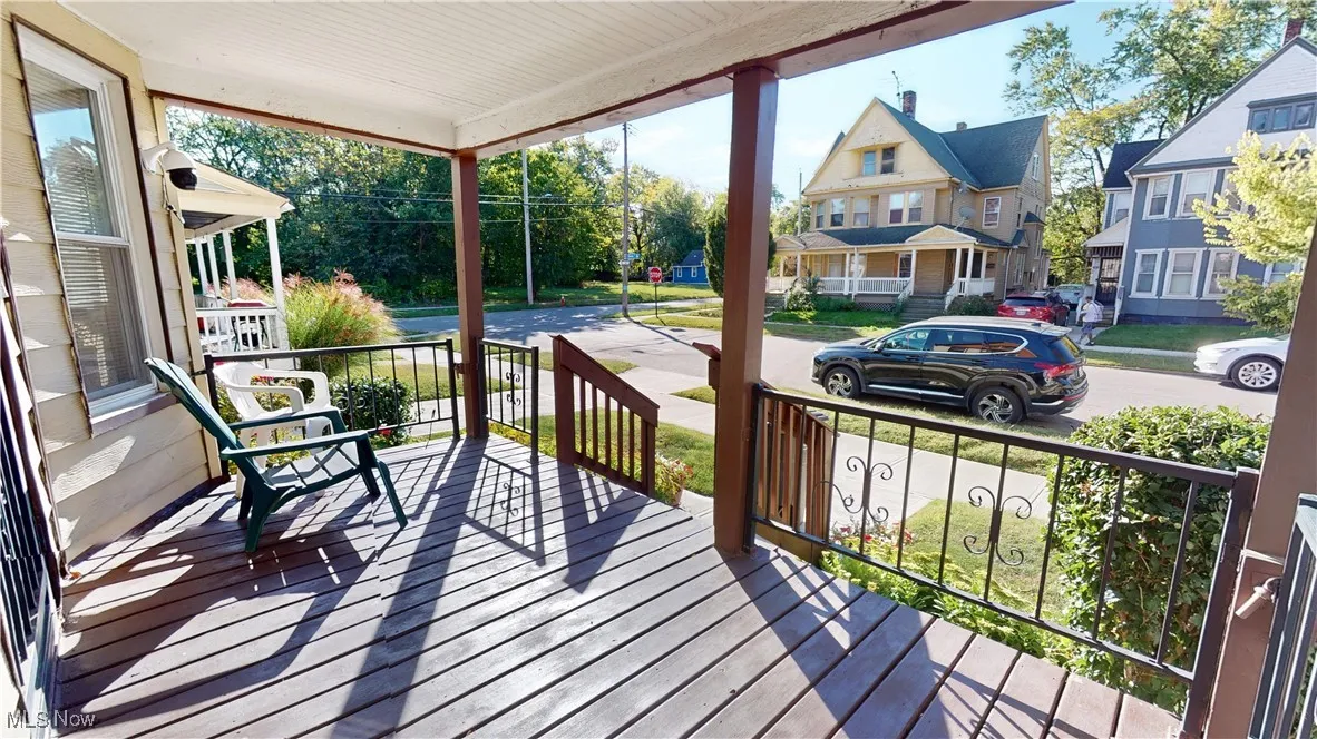 Wooden porch with a residential view