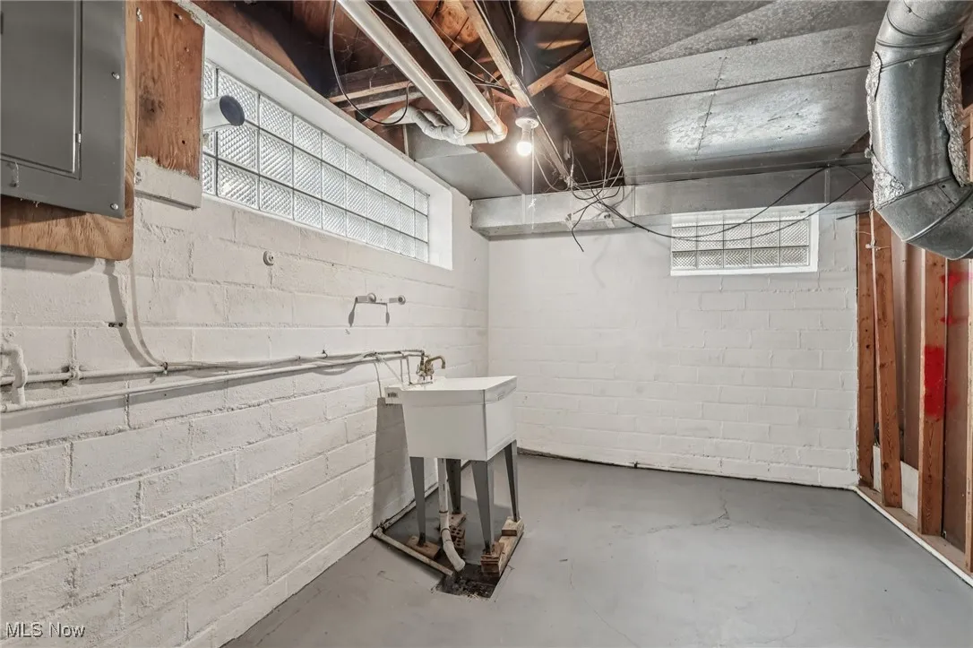 Basement featuring electric panel