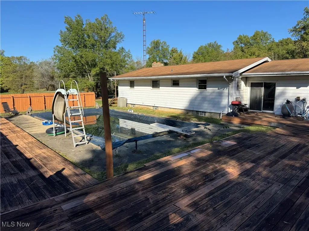 Wooden deck with a patio