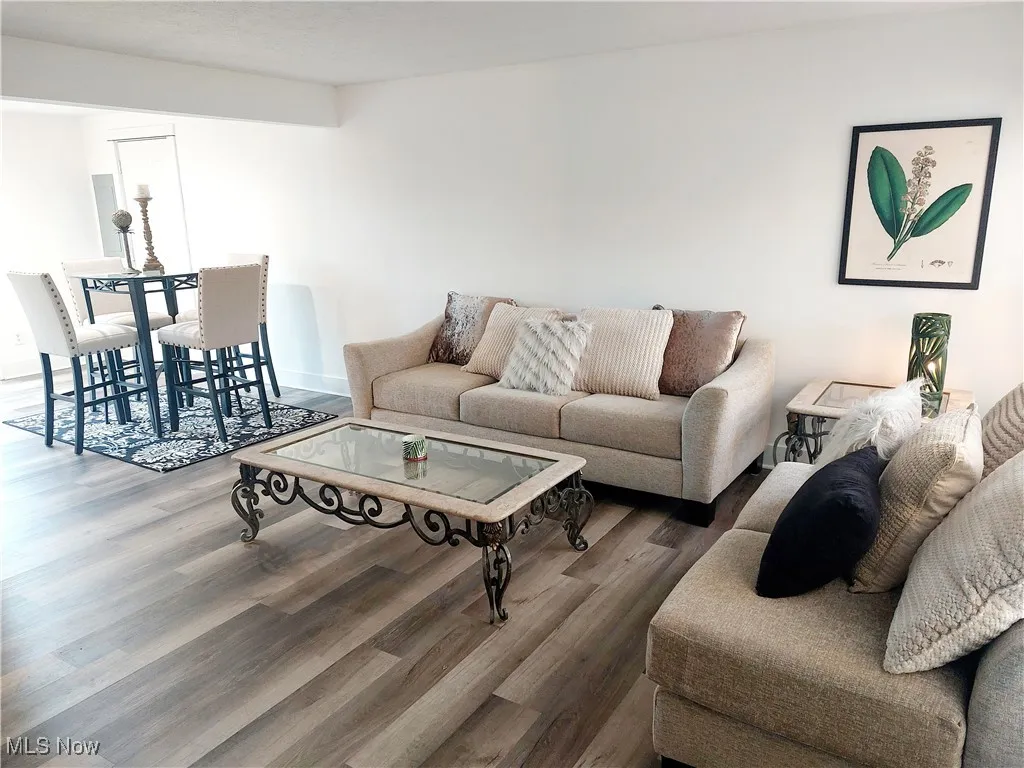 Living area with wood finished floors