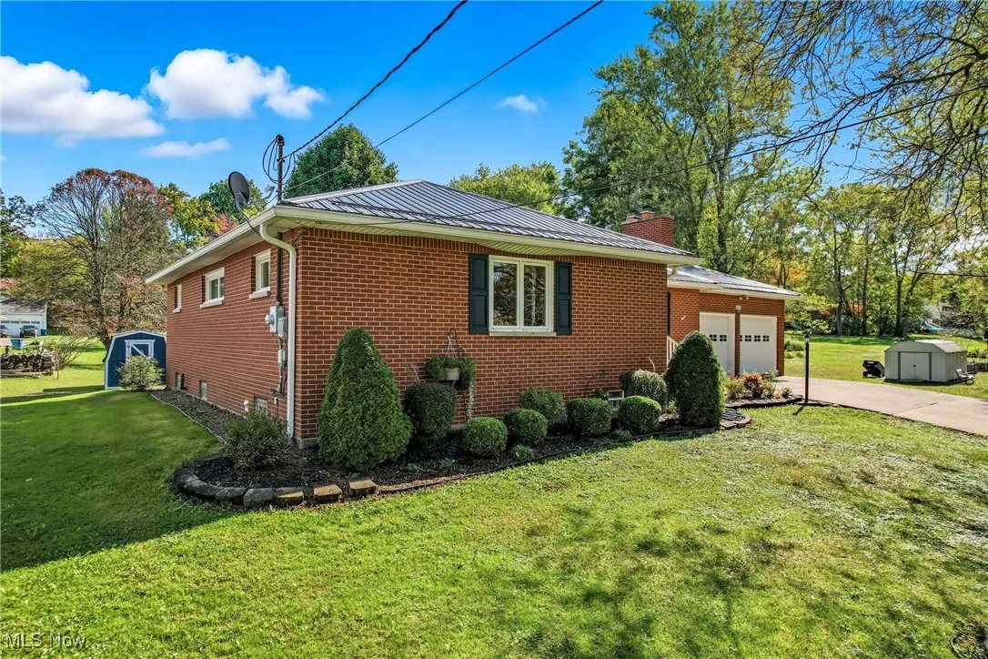 Ample storage with 2 sheds (blue : fully refurbished to back left of home & tan: new to right of driveway)